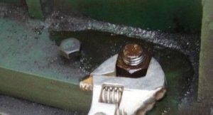 Unscrew A Rusted Bolt And Nut